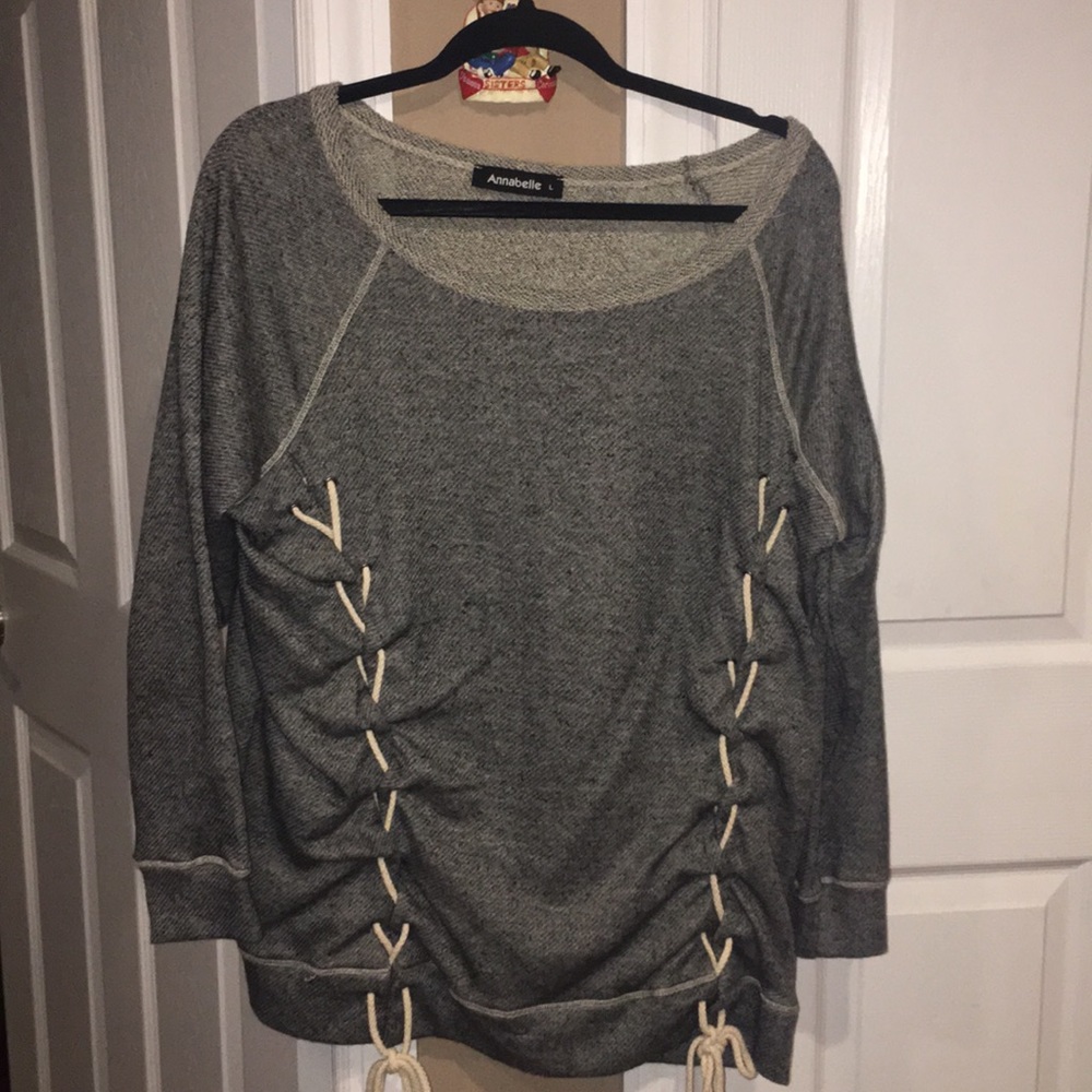 A cool fun shirt with lace ties down the front